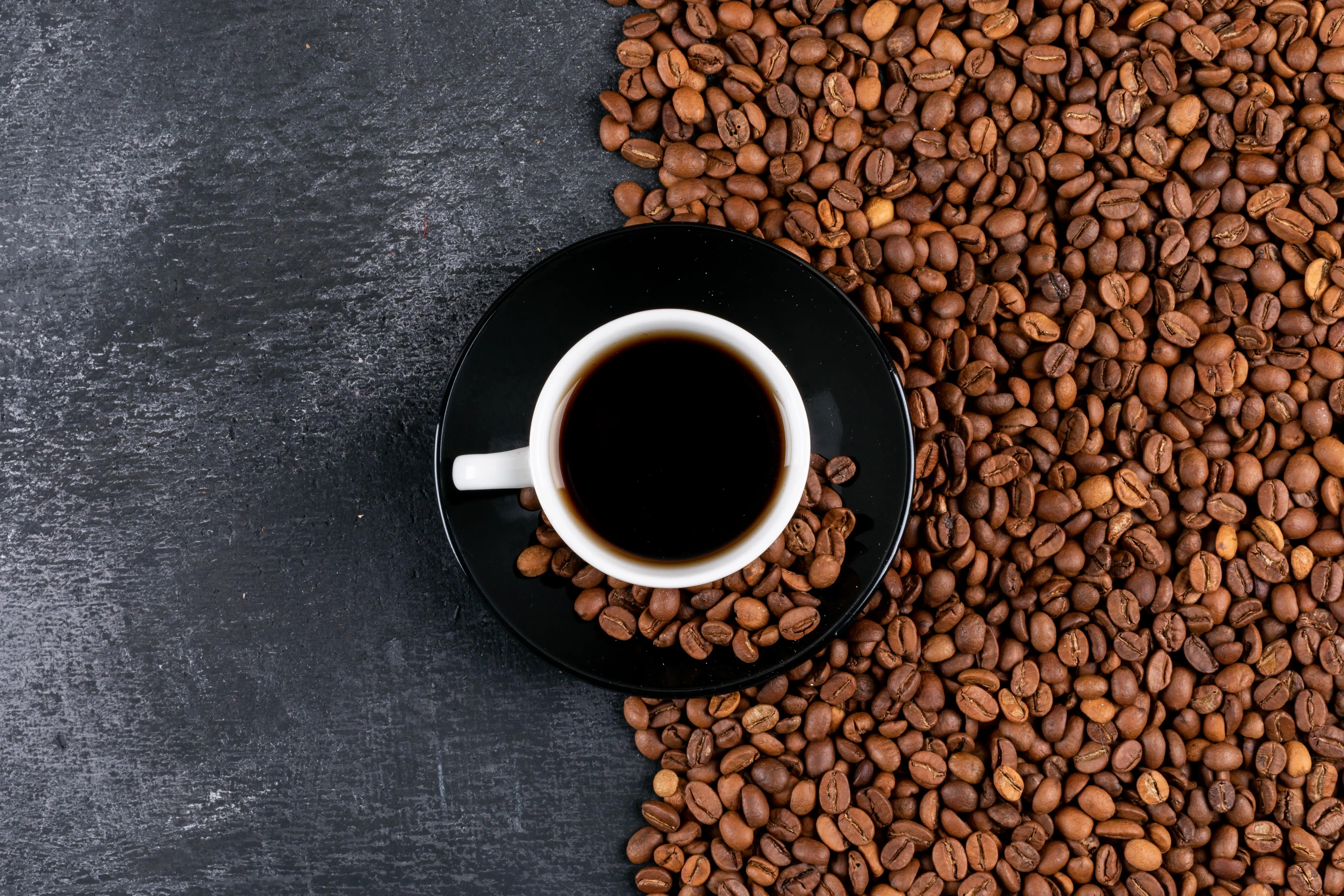 Coffee beans in a cup